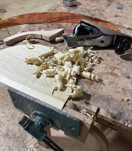 Hand planing our hand made wooden dustpans