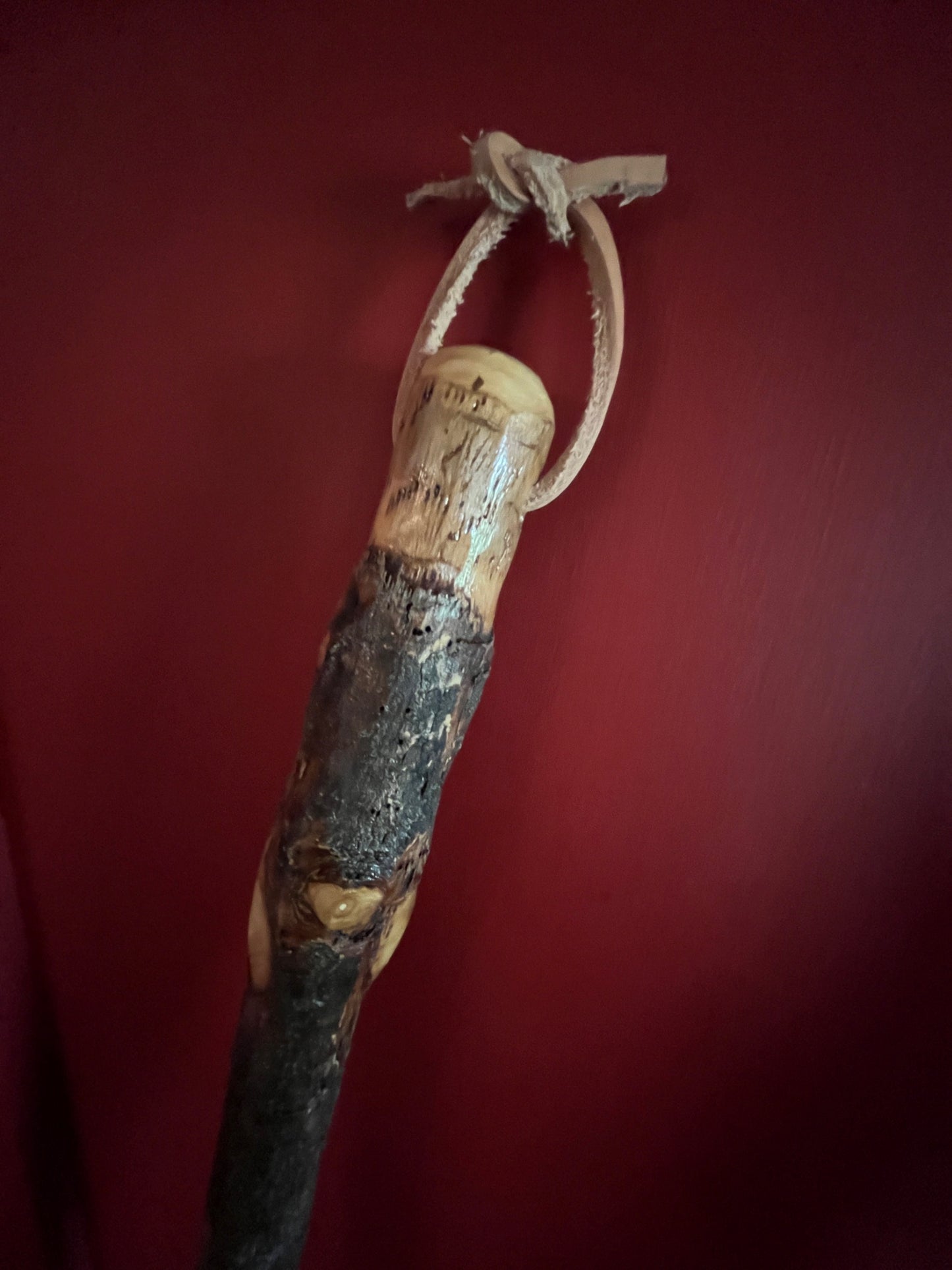 Handmade broomcorn broom on a tree branch broomstick