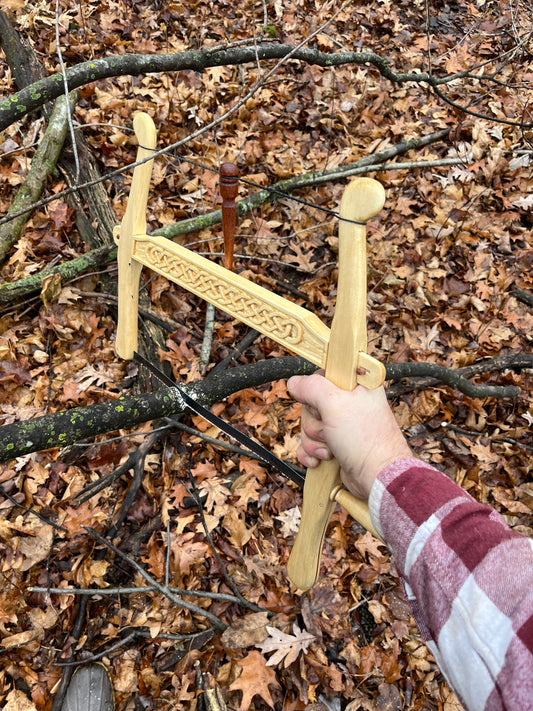 Foraging for tree branches for handmade brooms